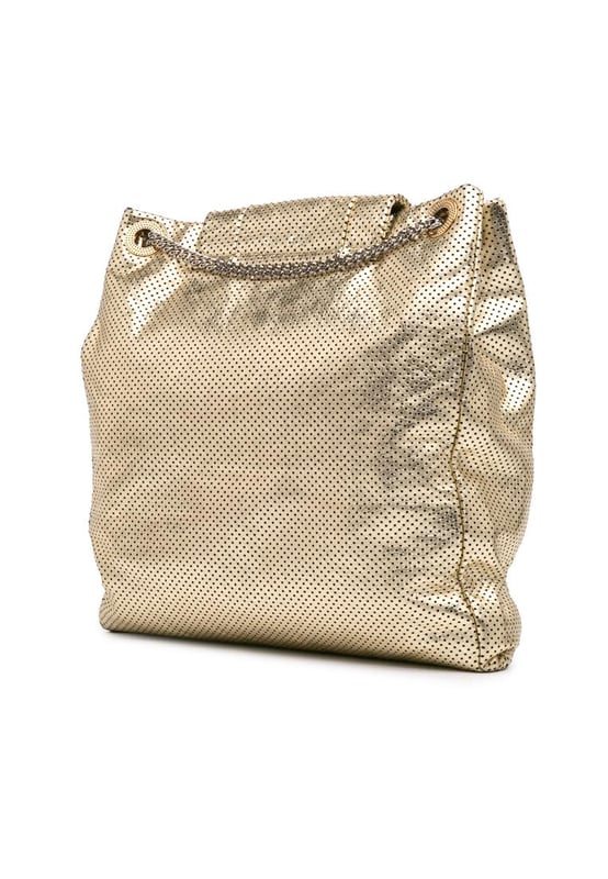 This tote bag features a perforated leather body chain link straps a top flap with a twist lock closure and interior zip and slip pockets.Brand: ChanelCondition: Pre-lovedType: Tote BagRating: B+Main Material: LeatherDimensions (LxWxD): 36x32.5x7Strap Drop: 33Comments: Exterior Back Worn. Lock Scratched. Exterior Corners Worn. Exterior Front Creased. Practical Attachment Scratched. Zipper Scratched.