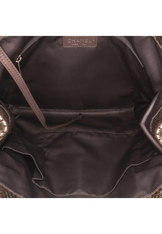 This tote bag features a perforated leather body chain link straps a top flap with a twist lock closure and interior zip and slip pockets.Brand: ChanelCondition: Pre-lovedType: Tote BagRating: B+Main Material: LeatherDimensions (LxWxD): 36x32.5x7Strap Drop: 33Comments: Exterior Back Worn. Lock Scratched. Exterior Corners Worn. Exterior Front Creased. Practical Attachment Scratched. Zipper Scratched.