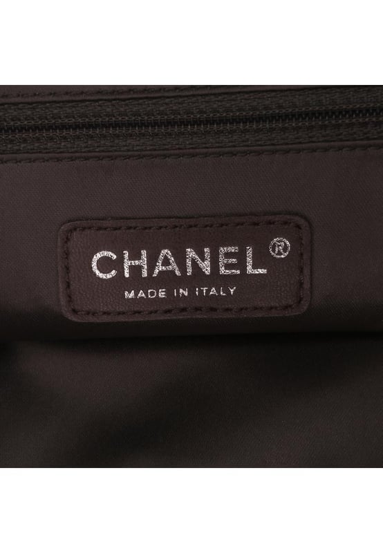 This tote bag features a perforated leather body chain link straps a top flap with a twist lock closure and interior zip and slip pockets.Brand: ChanelCondition: Pre-lovedType: Tote BagRating: B+Main Material: LeatherDimensions (LxWxD): 36x32.5x7Strap Drop: 33Comments: Exterior Back Worn. Lock Scratched. Exterior Corners Worn. Exterior Front Creased. Practical Attachment Scratched. Zipper Scratched.