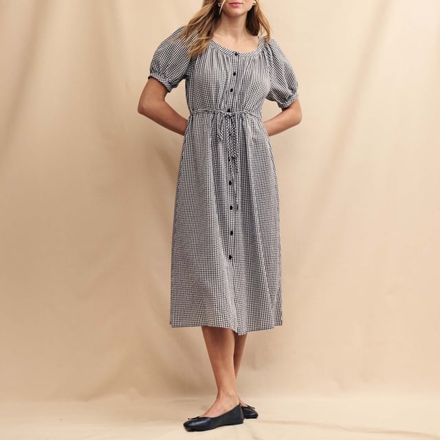 Womens Nobody's Child Jade Midi Dress in black - whiteSpend your summer in check. This black and white gingham dress comes with oversized sleeves and a button-up front finished with a string tie fastening - an extra detail that’s not to be missed. She’s called Jade and we think you’ll love her. Swing a straw bag over your arm and go. - Round neck- Mid-length puff sleeves- Button front- A-line skirt that skims the body- 67% Organic cotton  33% Recycled polyester.  Machine washable.- Ref: D240940BLK