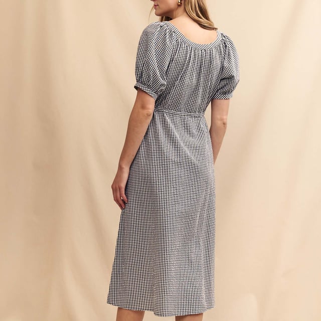 Womens Nobody's Child Jade Midi Dress in black - whiteSpend your summer in check. This black and white gingham dress comes with oversized sleeves and a button-up front finished with a string tie fastening - an extra detail that’s not to be missed. She’s called Jade and we think you’ll love her. Swing a straw bag over your arm and go. - Round neck- Mid-length puff sleeves- Button front- A-line skirt that skims the body- 67% Organic cotton  33% Recycled polyester.  Machine washable.- Ref: D240940BLK