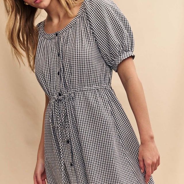 Womens Nobody's Child Jade Midi Dress in black - whiteSpend your summer in check. This black and white gingham dress comes with oversized sleeves and a button-up front finished with a string tie fastening - an extra detail that’s not to be missed. She’s called Jade and we think you’ll love her. Swing a straw bag over your arm and go. - Round neck- Mid-length puff sleeves- Button front- A-line skirt that skims the body- 67% Organic cotton  33% Recycled polyester.  Machine washable.- Ref: D240940BLK