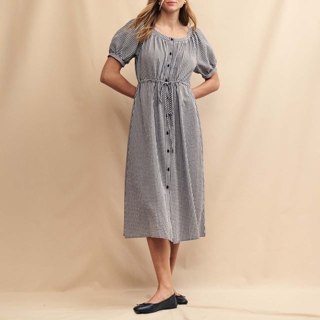 Womens Nobody's Child Jade Midi Dress in black - whiteSpend your summer in check. This black and white gingham dress comes with oversized sleeves and a button-up front finished with a string tie fastening - an extra detail that’s not to be missed. She’s called Jade and we think you’ll love her. Swing a straw bag over your arm and go. - Round neck- Mid-length puff sleeves- Button front- A-line skirt that skims the body- 67% Organic cotton  33% Recycled polyester.  Machine washable.- Ref: D240940BLK
