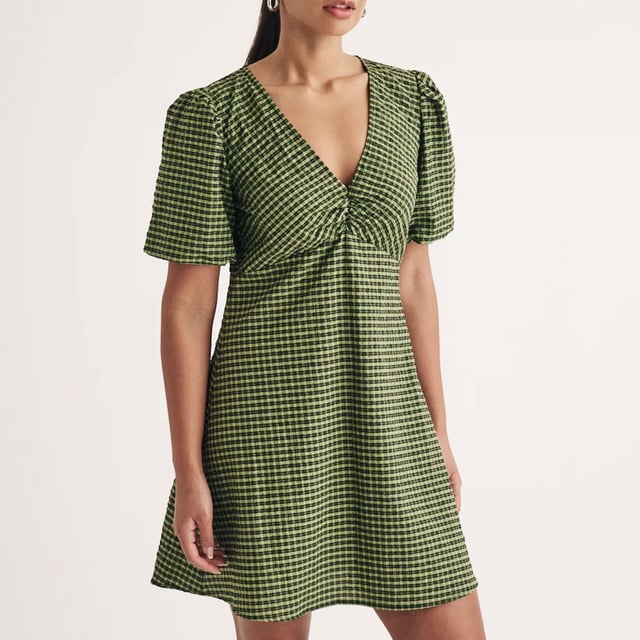 Women's Nobodys Child Liza Gingham Mini Dress in Green Womens Nobody's Child Liza Gingham Mini Dress in greenPrepare to fall in love with Liza. A flattering low v-neck and so-now khaki shade get a massive check from us. Take a walk on the wild side and style yours with statement shoes that shine.- V-neck- Short puff sleeves - Concealed zip fastening - Designed for a relaxed cut - 64% Organic cotton 35% Polyester 1% Elastane. Machine washable.- Ref: D242050GRN