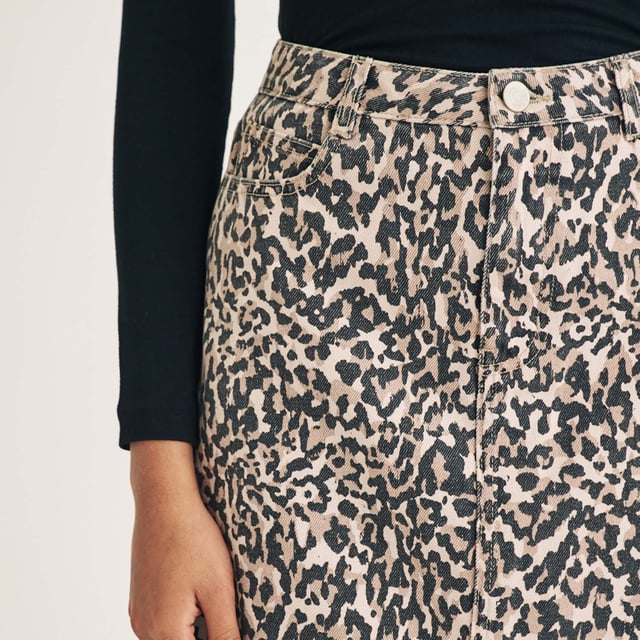Womens Nobody's Chile Leopard Print Denim Column Midi Skirt in brownEveryone’s favourite neutral. This leopard print denim column skirt is soon-to-be trending. Sitting high on the waist with a fitted shape that skims the figure  plus a front slit  this is comfort with a stylish twist. We’re wearing ours with a black top and loafers.- Classic five pocket style- Silver-tone NC buttons- Belt loops- Size tip: we recommend your usual size- 100% Organic cotton.  Machine washable.- Ref: B250125BRN