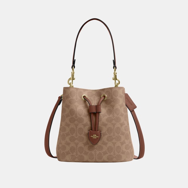 Rowan Bucket Bag in Signature Canvas, Removable zip pouch
 Center open compartment,  Length: 21.50 cm,  Width: 14.00 cm,  Height: 21.50 cm