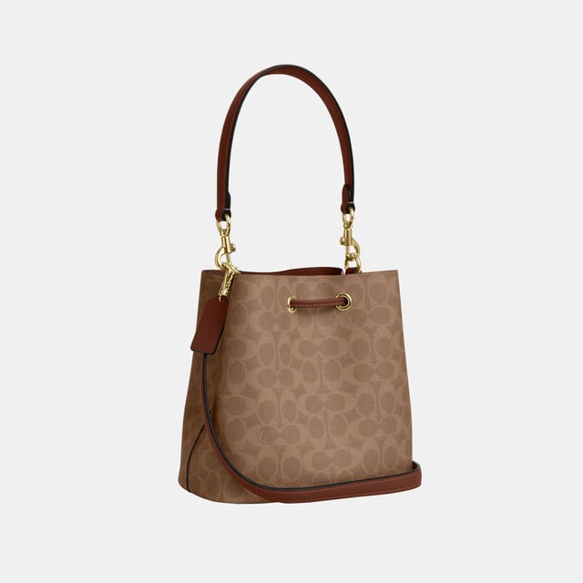 Rowan Bucket Bag in Signature Canvas, Removable zip pouch
 Center open compartment,  Length: 21.50 cm,  Width: 14.00 cm,  Height: 21.50 cm