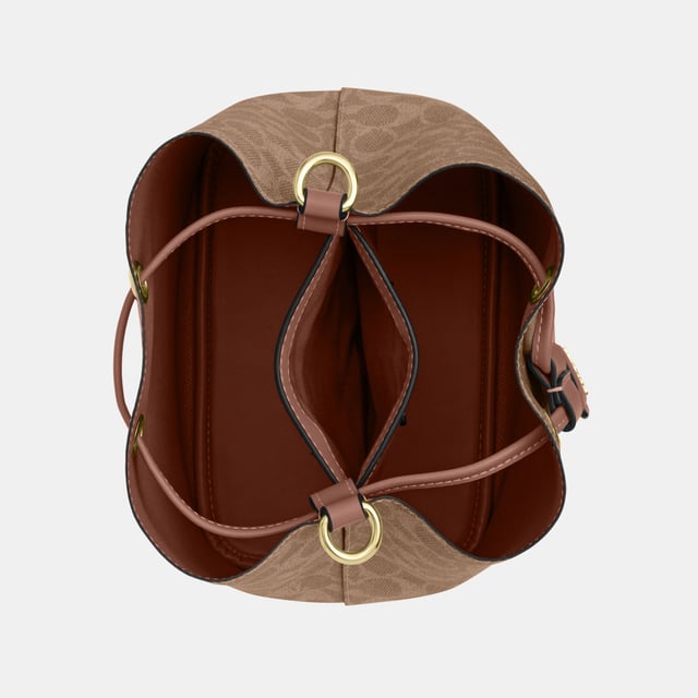 Rowan Bucket Bag in Signature Canvas, Removable zip pouch
 Center open compartment,  Length: 21.50 cm,  Width: 14.00 cm,  Height: 21.50 cm