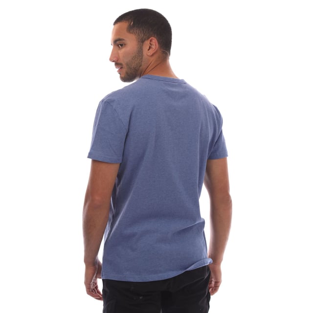 Mens Tommy Hilfiger Tonal Badge T- Shirt in blue.- Ribbed crewneck.- Short sleeves.- Slightly dropped shoulders.- Tonal Tommy badge patch on chest.- Tommy Jeans branding.- Regular fit.- 100% Cotton.- Ref.: DM0DM20322DSF