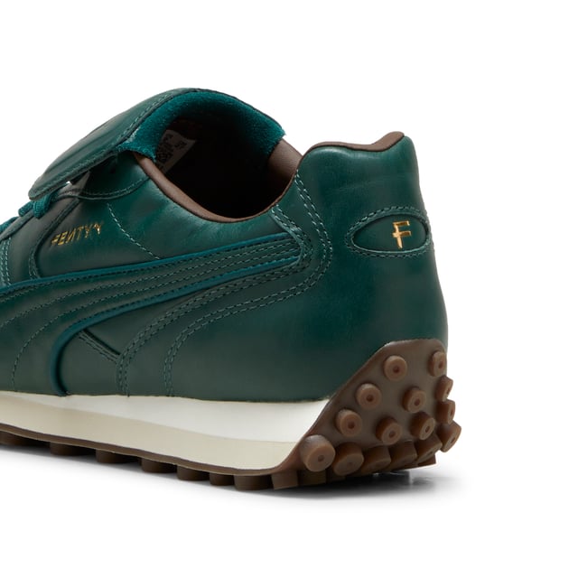 PRODUCT STORY: The newest FENTY x PUMA Avanti by Rihanna is reinvented with premium leather, touches of gold, and retro gum soles. Inspired by football legends, this Avanti is worn by Romeo Beckham and many others in the latest FENTY x PUMA campaign. DETAILS: Oil-treated leather on upper, which wears over time; Lace closure; Foam wedge midsole; Dark gum outsole; FENTY x PUMA co-branding details.