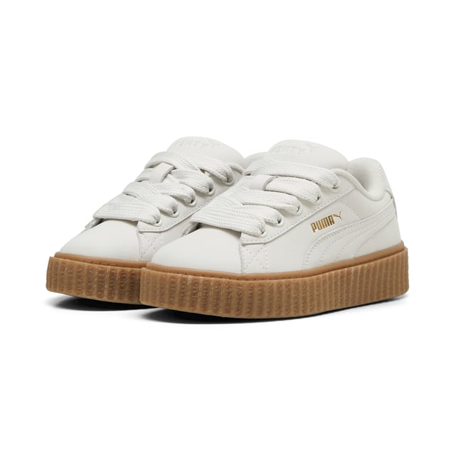 PRODUCT STORY: Rihanna and PUMA get down to earth with the Creeper Phatty Earth Tone. Made with luxe, high-quality nubuck, the new FENTY x PUMA Creeper Phatty stands out while blending in with soft, natural colors. Touches of gold and the classic Creeper sole elevate this new drop from Rihanna.DETAILS: Leather upper; Lace closure; Ribbed gum midsole; Gum outsole; PUMA Kids: Recommended for young kids between 4 and 8 years.