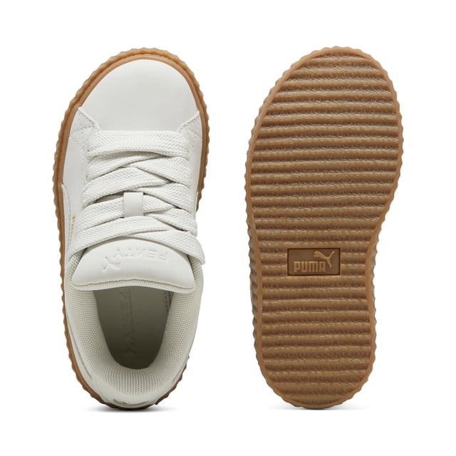 PRODUCT STORY: Rihanna and PUMA get down to earth with the Creeper Phatty Earth Tone. Made with luxe, high-quality nubuck, the new FENTY x PUMA Creeper Phatty stands out while blending in with soft, natural colors. Touches of gold and the classic Creeper sole elevate this new drop from Rihanna.DETAILS: Leather upper; Lace closure; Ribbed gum midsole; Gum outsole; PUMA Kids: Recommended for young kids between 4 and 8 years.