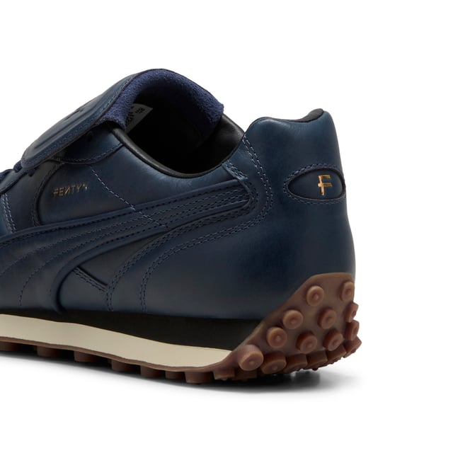 PRODUCT STORY: The newest FENTY x PUMA Avanti by Rihanna is reinvented with premium leather, touches of gold, and retro gum soles. Inspired by football legends, this Avanti is worn by Romeo Beckham and many others in the latest FENTY x PUMA campaign. DETAILS: Oil-treated leather on upper, which wears over time; Lace closure; Foam wedge midsole; Dark gum outsole; FENTY x PUMA co-branding details.