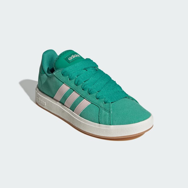 Stylish yet practical, these adidas sneakers are your go-to. Whether wandering city streets or lounging in the park, the rich suede upper, emblazoned with the 3-Stripes, makes an instant impression. A classic rubber cupsole completes the look, adding sporty flair while providing traction on any terrain. Wear yours with everything from jeans to dresses. This product features at least 20% recycled materials. By reusing materials that have already been created, adidas help to reduce waste and our reliance on finite resources and reduce the footprint of the products adidas make.  - Regular fit - Lace closure - Suede upper - Textile lining - Rubber cupsole - Contains at least 20% recycled content  Shipped by adidas