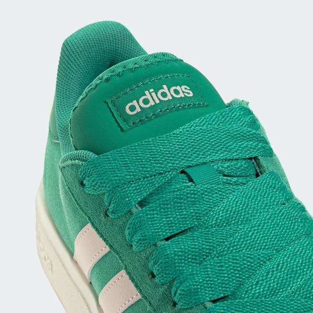 Stylish yet practical, these adidas sneakers are your go-to. Whether wandering city streets or lounging in the park, the rich suede upper, emblazoned with the 3-Stripes, makes an instant impression. A classic rubber cupsole completes the look, adding sporty flair while providing traction on any terrain. Wear yours with everything from jeans to dresses. This product features at least 20% recycled materials. By reusing materials that have already been created, adidas help to reduce waste and our reliance on finite resources and reduce the footprint of the products adidas make.  - Regular fit - Lace closure - Suede upper - Textile lining - Rubber cupsole - Contains at least 20% recycled content  Shipped by adidas