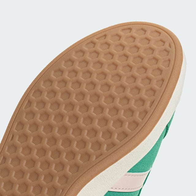 Stylish yet practical, these adidas sneakers are your go-to. Whether wandering city streets or lounging in the park, the rich suede upper, emblazoned with the 3-Stripes, makes an instant impression. A classic rubber cupsole completes the look, adding sporty flair while providing traction on any terrain. Wear yours with everything from jeans to dresses. This product features at least 20% recycled materials. By reusing materials that have already been created, adidas help to reduce waste and our reliance on finite resources and reduce the footprint of the products adidas make.  - Regular fit - Lace closure - Suede upper - Textile lining - Rubber cupsole - Contains at least 20% recycled content  Shipped by adidas