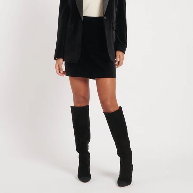 Women's Nobodys Child Ragusa Velvet Mini Skirt. Mini length, maximum style. Crafted from recycled materials woven into velvet, this classic black mini skirt comes with, an always flattering cut and a concealed zip at the back. We’re wearing ours with boots.- Designed for a close cut.- Concealed zip fastening.- Size tip: we recommend your usual size. Material: 100% Polyester (Recycled). Ref: P243197BLK.