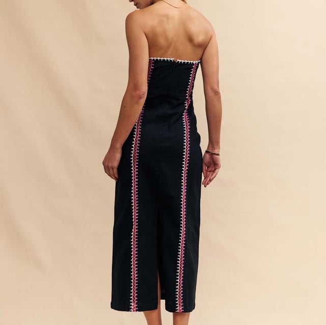 Women's Nobodys Child Raphaela Midaxi Dress. A total vibe. This black bandeau midaxi dress has been finished with statement whipstitching in white, red and pink. The detailing gives off a bohemian air that we’re seriously into. Elevate the look with barely-there sandals or wear her on holiday with summer sandals.- Concealed zip fastening.- Designed for a close cut.- Size tip: we recommend your usual size. Material: 100% Organic Cotton. Ref: D240572BLK.