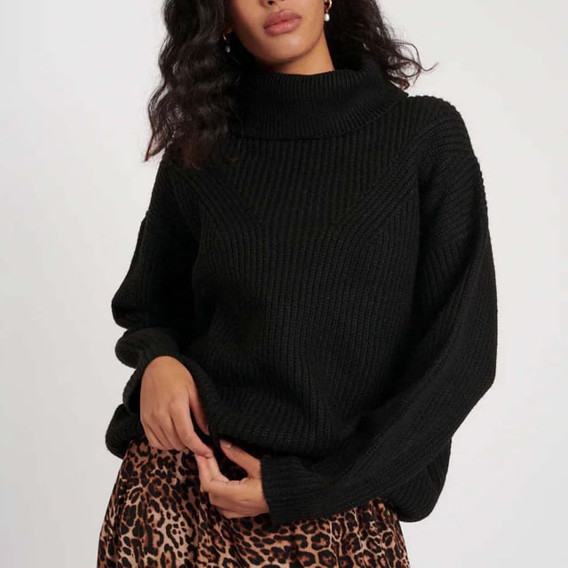 Women's Nobodys Child Longline Funnel Neck Sweater. Make a cosy update to your current jumper collection with this classic black layer. Your new go-to number features a funnel neck, long sleeves and ribbed cuffs. Style yours with denim.- Funnel neck.- Long sleeves.- Ribbed trims.- Designed for a relaxed cut.- We recommend folding your knits to avoid any unwanted stretching. Material: 62% Organic Cotton, 38% Polyester (Recycled). Ref: K241787BLK.