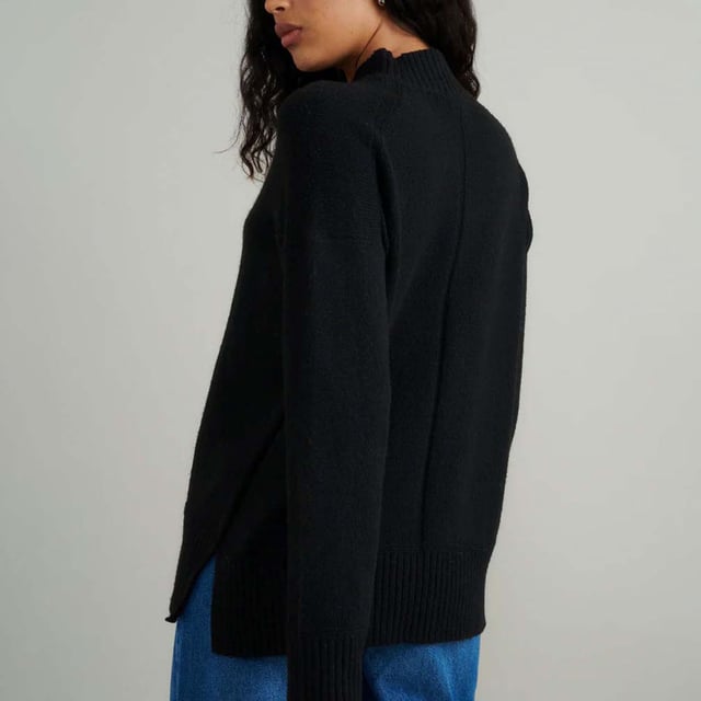 Women's Nobodys Child Longline Funnel Neck Sweater. Make a cosy update to your current jumper collection with this classic black layer. Your new go-to number features a funnel neck, long sleeves and ribbed cuffs. Style yours with denim.- Funnel neck.- Long sleeves.- Ribbed trims.- Designed for a relaxed cut.- We recommend folding your knits to avoid any unwanted stretching. Material: 62% Organic Cotton, 38% Polyester (Recycled). Ref: K241787BLK.