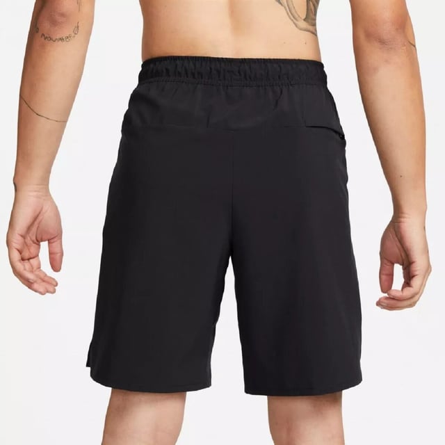 Nike Mens Dri Fit Unlimited Black Training Shorts The Nike Dri-FIT Unlimited Men’s 7-Inch Unlined Woven Fitness Shorts are a perfect upgrade to your workout wardrobe. Crafted from lightweight material, they feature an elastic waistband with an adjustable drawcord for a snug, secure fit. Equipped with Dri-FIT technology, these shorts wick away sweat to help you stay dry and focused during your training. Their solid color design is complemented by the iconic Nike Swoosh branding. They are machine washable—please follow the care label instructions for proper maintenance.