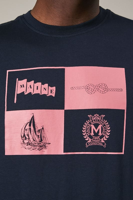 Crafted from soft cotton jersey for all-day comfort
        Features a distinctive sailing crest graphic print in contrasting hues
        Classic crew neck design with short sleeves for a timeless silhouette
        Straight hem with clean finishing for a polished appearance
        Part of the Maine collection, reflecting nautical heritage and style
    
    This Maine Sailing Crest Print T-shirt combines casual comfort with maritime charm. The striking quadrant design showcases nautical motifs including a sailing boat and crest emblem, perfect for adding character to your weekend wardrobe. Style as seen on our model with light-coloured shorts and crisp white trainers for an effortless summer look that works brilliantly for coastal walks or casual gatherings. For cooler evenings, layer under a lightweight bomber jacket or unstructured blazer. The versatile design transitions seamlessly from daytime outings to relaxed evening socials, making it an essential addition to your casual collection. Machine washable at 30 degrees, this t-shirt maintains its shape and graphic detail with proper care.