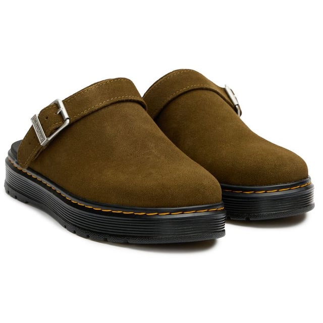 The Dr Martens Brookline slides bring rebellious attitude to warm-weather styling. These green leather sandals maintain the brand's iconic DNA with their signature buckle detailing and classic Goodyear-welted construction. The air-cushioned rubber sole delivers that familiar bouncy comfort, while the synthetic lining ensures durability. Perfect for those who refuse to compromise on style or comfort when temperatures rise â these versatile slides effortlessly blend Dr Martens' rugged heritage with practical summer design.