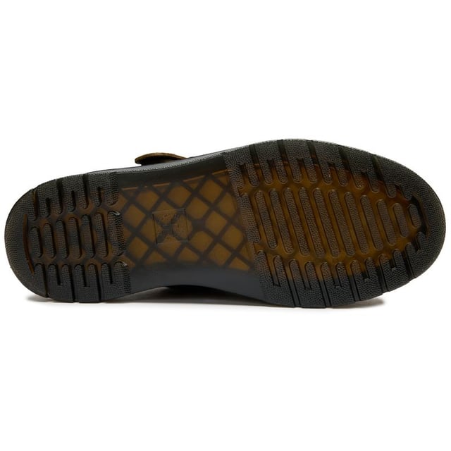 The Dr Martens Brookline slides bring rebellious attitude to warm-weather styling. These green leather sandals maintain the brand's iconic DNA with their signature buckle detailing and classic Goodyear-welted construction. The air-cushioned rubber sole delivers that familiar bouncy comfort, while the synthetic lining ensures durability. Perfect for those who refuse to compromise on style or comfort when temperatures rise â these versatile slides effortlessly blend Dr Martens' rugged heritage with practical summer design.