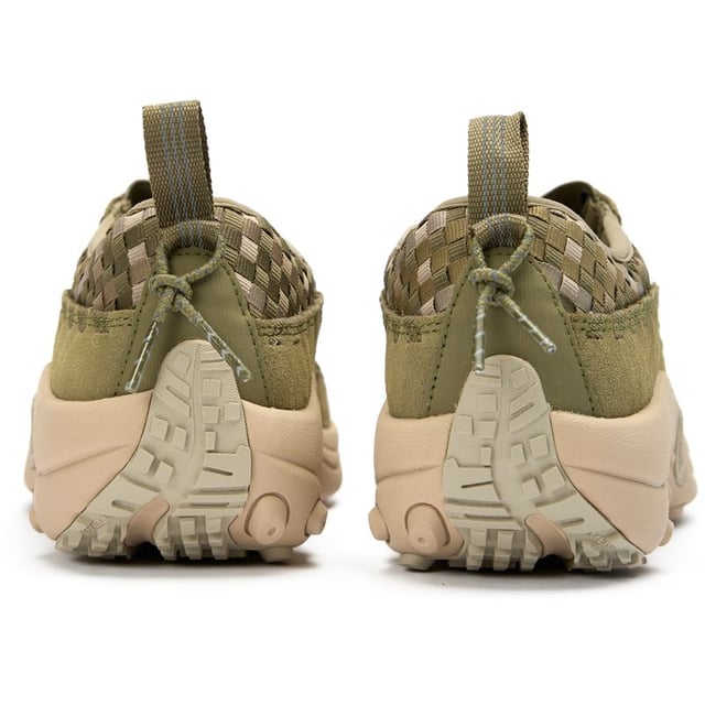 Experience eco-conscious performance with the Merrell Jungle Moc Evo Woven. These green trainers marry durability and sustainability, featuring a distinctive knitted nylon upper and 100% recycled laces and webbing. The protective rubber heel provides stability while you enjoy the comfort of breathable recycled mesh lining. Designed with CleanSport NXT odour control, these versatile shoes keep feet fresh during all-day wear. Perfect for outdoor enthusiasts who value both functionality and environmental responsibility.