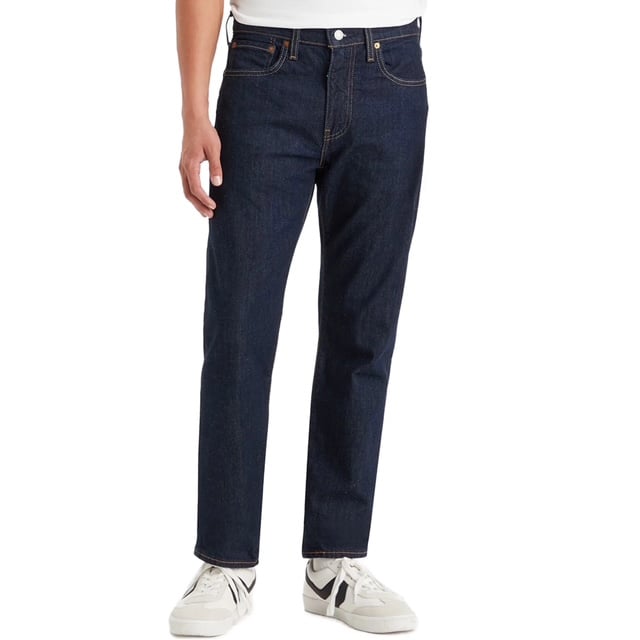 The Levi’s® 502™ Tapered Jeans offer a versatile style that works for any occasion. Designed to sit below the waist with extra room in the thigh, these jeans gradually taper down to the ankle, creating a clean, tailored look without sacrificing comfort. Made from durable denim with just the right amount of stretch, they provide day-to-night wearability and freedom of movement.