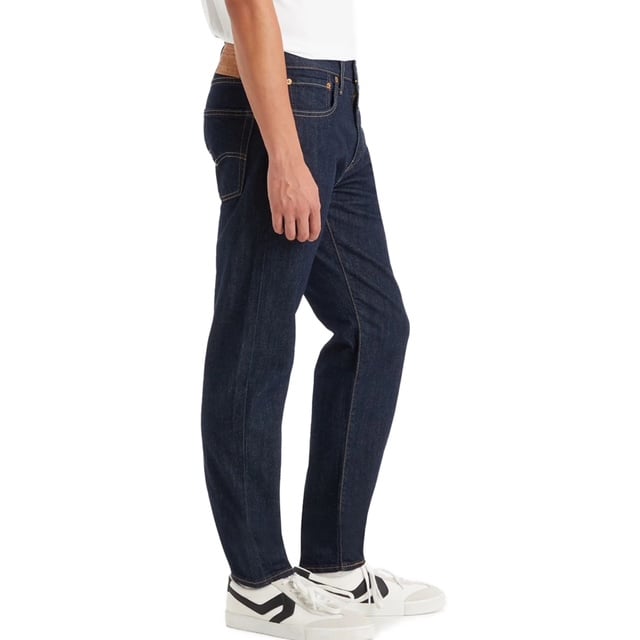 The Levi’s® 502™ Tapered Jeans offer a versatile style that works for any occasion. Designed to sit below the waist with extra room in the thigh, these jeans gradually taper down to the ankle, creating a clean, tailored look without sacrificing comfort. Made from durable denim with just the right amount of stretch, they provide day-to-night wearability and freedom of movement.