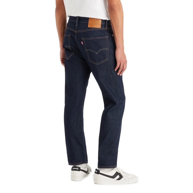 The Levi’s® 502™ Tapered Jeans offer a versatile style that works for any occasion. Designed to sit below the waist with extra room in the thigh, these jeans gradually taper down to the ankle, creating a clean, tailored look without sacrificing comfort. Made from durable denim with just the right amount of stretch, they provide day-to-night wearability and freedom of movement.