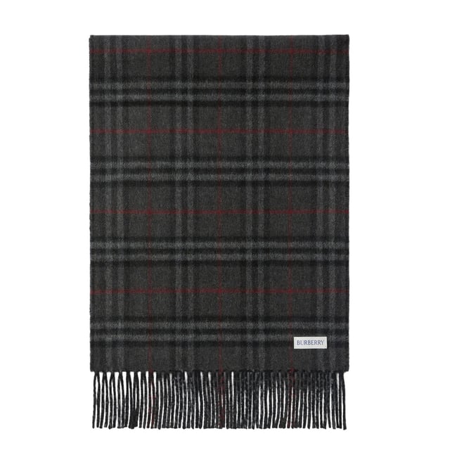 Wrap yourself in luxury with our Burberry checked Reversible Black Cashmere Scarf. Made with 100% cashmere, it's incredibly soft and warm, perfect for keeping you cozy on chilly days. Its timeless vintage check pattern adds a touch of sophistication to any outfit. With a generous size of 160x30cm, it can be styled in a variety of ways, making it a versatile and must-have accessory for any wardrobe. Elevate your style and stay warm with our Burberry cashmere scarf