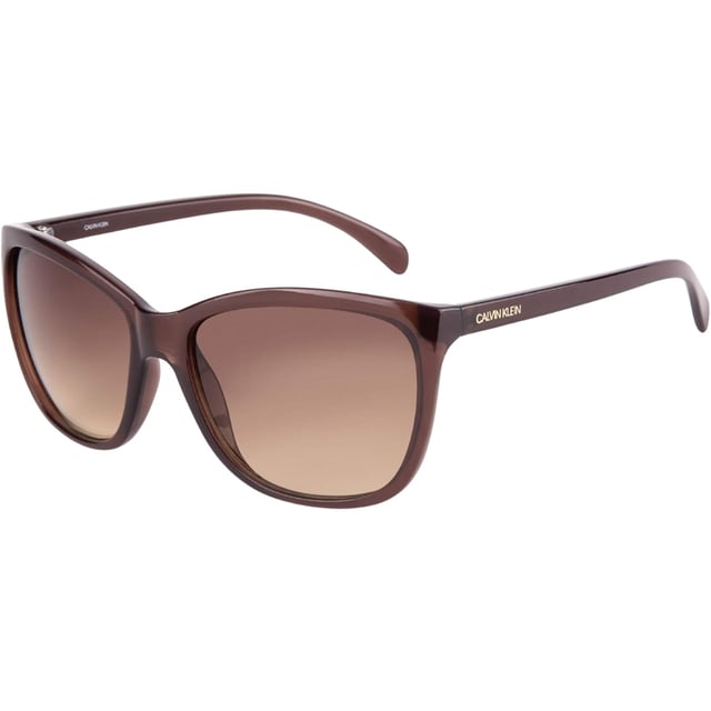Elevate your style with these sophisticated Calvin Klein sunglasses featuring a luxurious milky brown frame complemented by elegant brown gradient lenses. Expertly crafted with precise 60x17x140 dimensions for the perfect fit and ultimate comfort. 100% Plastic