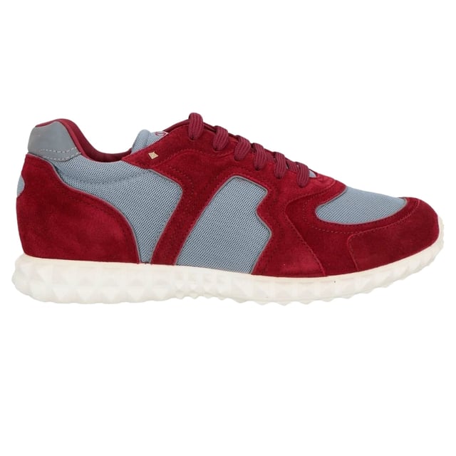 Elevate your style with these exquisite Valentino Burgundy/Blue Trainers. Crafted in Italy with meticulous attention to detail, these sophisticated men's shoes blend luxury and comfort for the discerning gentleman. The striking color combination makes these premium trainers an essential addition to your footwear collection. 100% Textile