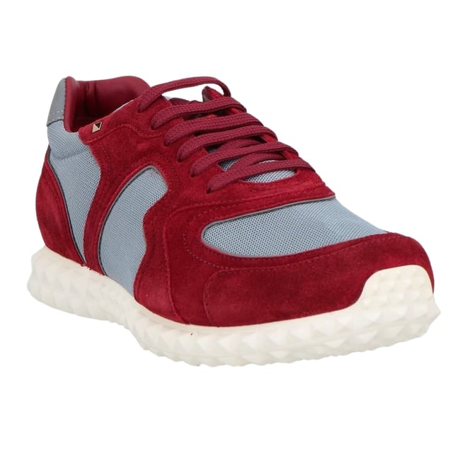 Elevate your style with these exquisite Valentino Burgundy/Blue Trainers. Crafted in Italy with meticulous attention to detail, these sophisticated men's shoes blend luxury and comfort for the discerning gentleman. The striking color combination makes these premium trainers an essential addition to your footwear collection. 100% Textile