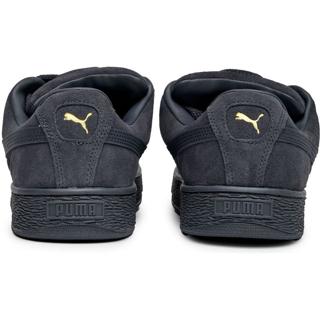 Zapatillas Puma Suede XL para hombre, grises, fabricadas en ante y con suela de goma. Presentan: diseño XL, lengüeta acolchada, cordones gruesos y cordones de repuesto.