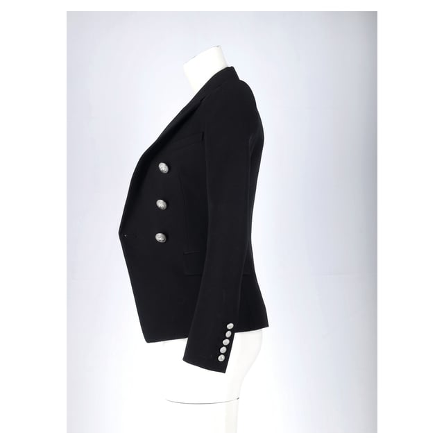 VINTAGE, RRP AS NEW
Enrich your formal styles by adding amazing, flawless pieces like this blazer from the House of Balmain. It has been designed using black wool and flaunts a double-breasted style, three external pockets, and buttoned cuffs. Stylish and beautiful, this blazer will highlight your chic styling choices well.



Balmain Double Breasted Blazer in Black Wool 
Condition: Very good
Signs of wear: No retail tag but Brand tag on., Minor sign of wear or markings., Lightly used but very well maintained. Small pull thread or light peeling.
Packaging: None
Color: black
Material: Wool
Size: FR | 34
Measurements: Length: 640; Chest: 360
SKU: NAPPUGBCL462420W
