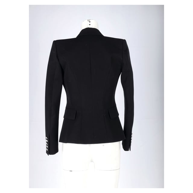 VINTAGE, RRP AS NEW
Enrich your formal styles by adding amazing, flawless pieces like this blazer from the House of Balmain. It has been designed using black wool and flaunts a double-breasted style, three external pockets, and buttoned cuffs. Stylish and beautiful, this blazer will highlight your chic styling choices well.



Balmain Double Breasted Blazer in Black Wool 
Condition: Very good
Signs of wear: No retail tag but Brand tag on., Minor sign of wear or markings., Lightly used but very well maintained. Small pull thread or light peeling.
Packaging: None
Color: black
Material: Wool
Size: FR | 34
Measurements: Length: 640; Chest: 360
SKU: NAPPUGBCL462420W