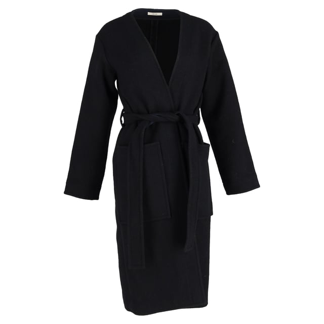 VINTAGE, RRP AS NEW
Quiet luxury, redefined.
Wrap yourself in the ultimate expression of elegance with the Celine Belted Coat in Black Cashmere. Designed in a fluid, minimalist silhouette, this coat exudes understated sophistication with its buttery-soft cashmere, tailored shoulders, and a self-tie belt that cinches the waist for a graceful, feminine shape. The deep black hue offers timeless versatility, making it the ideal outer layer for everything from silk dresses to structured workwear. It’s not just a coat—it’s a wardrobe investment in everyday refinement.

Celine Belted Coat in Black Cashmere
Condition: Excellent
Signs of wear: No retail tag but Brand tag on., No visible sign of wear., 
Packaging: None
Color: Black 
Material: Cashmere
Size: EU | 38
Measurements: Length: 1150; Chest: 550
SKU: NAPPUGBCL473819W