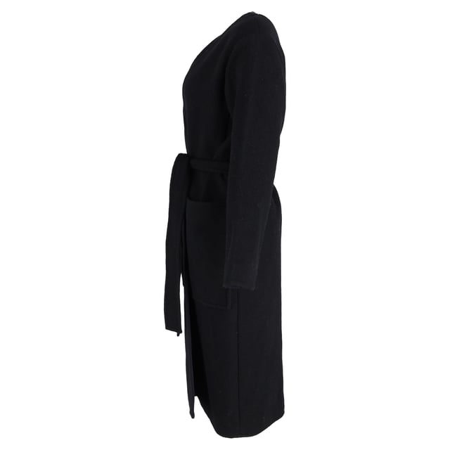 VINTAGE, RRP AS NEW
Quiet luxury, redefined.
Wrap yourself in the ultimate expression of elegance with the Celine Belted Coat in Black Cashmere. Designed in a fluid, minimalist silhouette, this coat exudes understated sophistication with its buttery-soft cashmere, tailored shoulders, and a self-tie belt that cinches the waist for a graceful, feminine shape. The deep black hue offers timeless versatility, making it the ideal outer layer for everything from silk dresses to structured workwear. It’s not just a coat—it’s a wardrobe investment in everyday refinement.

Celine Belted Coat in Black Cashmere
Condition: Excellent
Signs of wear: No retail tag but Brand tag on., No visible sign of wear., 
Packaging: None
Color: Black 
Material: Cashmere
Size: EU | 38
Measurements: Length: 1150; Chest: 550
SKU: NAPPUGBCL473819W