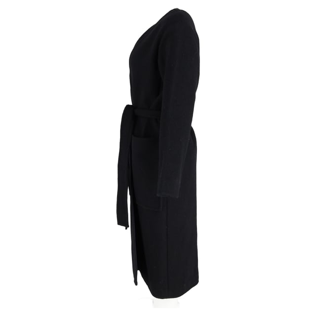 VINTAGE, RRP AS NEW
Quiet luxury, redefined.
Wrap yourself in the ultimate expression of elegance with the Celine Belted Coat in Black Cashmere. Designed in a fluid, minimalist silhouette, this coat exudes understated sophistication with its buttery-soft cashmere, tailored shoulders, and a self-tie belt that cinches the waist for a graceful, feminine shape. The deep black hue offers timeless versatility, making it the ideal outer layer for everything from silk dresses to structured workwear. It’s not just a coat—it’s a wardrobe investment in everyday refinement.

Celine Belted Coat in Black Cashmere
Condition: Excellent
Signs of wear: No retail tag but Brand tag on., No visible sign of wear., 
Packaging: None
Color: Black 
Material: Cashmere
Size: EU | 38
Measurements: Length: 1150; Chest: 550
SKU: NAPPUGBCL473819W