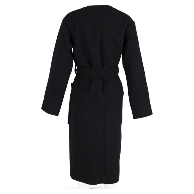 VINTAGE, RRP AS NEW
Quiet luxury, redefined.
Wrap yourself in the ultimate expression of elegance with the Celine Belted Coat in Black Cashmere. Designed in a fluid, minimalist silhouette, this coat exudes understated sophistication with its buttery-soft cashmere, tailored shoulders, and a self-tie belt that cinches the waist for a graceful, feminine shape. The deep black hue offers timeless versatility, making it the ideal outer layer for everything from silk dresses to structured workwear. It’s not just a coat—it’s a wardrobe investment in everyday refinement.

Celine Belted Coat in Black Cashmere
Condition: Excellent
Signs of wear: No retail tag but Brand tag on., No visible sign of wear., 
Packaging: None
Color: Black 
Material: Cashmere
Size: EU | 38
Measurements: Length: 1150; Chest: 550
SKU: NAPPUGBCL473819W
