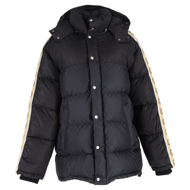 VINTAGE, RRP AS NEW
Make a bold winter statement with the Gucci Logo-Jacquard Webbing-Trimmed Quilted Shell Hooded Down Jacket in Black Nylon. This stylish jacket features Gucci’s iconic interlocking 'GG' insignia, making it an unmistakable fashion-forward choice for colder months. Crafted from a blend of solid and monogrammed black shell, the jacket showcases logo-jacquard taping down the sleeves for a modern, branded touch. The quilted design evenly disperses the down filling, ensuring optimal warmth and comfort while maintaining a sleek silhouette. Whether you're navigating the city streets or enjoying après-ski, this jacket adds a touch of luxury and sophistication to your winter wardrobe, pairing effortlessly with both casual and elevated looks.


Gucci Logo-Jacquard Webbing-Trimmed Quilted Shell Hooded Down Jacket in Black Nylon
Condition: Excellent
Signs of wear: No retail tag but Brand tag on., No visible sign of wear., 
Packaging: None
Color: black
Material: Nylon
Size: INT | XL/IT46
Measurements: Length: 750; Chest: 650
SKU: NAPPUGBCL461250W