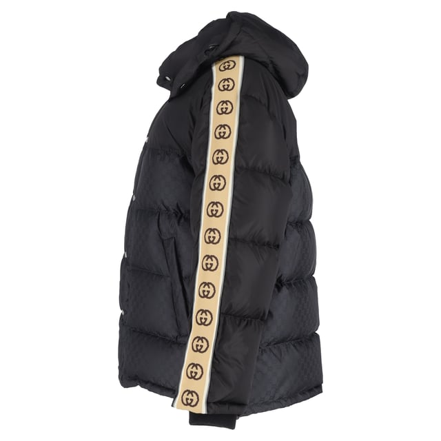 VINTAGE, RRP AS NEW
Make a bold winter statement with the Gucci Logo-Jacquard Webbing-Trimmed Quilted Shell Hooded Down Jacket in Black Nylon. This stylish jacket features Gucci’s iconic interlocking 'GG' insignia, making it an unmistakable fashion-forward choice for colder months. Crafted from a blend of solid and monogrammed black shell, the jacket showcases logo-jacquard taping down the sleeves for a modern, branded touch. The quilted design evenly disperses the down filling, ensuring optimal warmth and comfort while maintaining a sleek silhouette. Whether you're navigating the city streets or enjoying après-ski, this jacket adds a touch of luxury and sophistication to your winter wardrobe, pairing effortlessly with both casual and elevated looks.


Gucci Logo-Jacquard Webbing-Trimmed Quilted Shell Hooded Down Jacket in Black Nylon
Condition: Excellent
Signs of wear: No retail tag but Brand tag on., No visible sign of wear., 
Packaging: None
Color: black
Material: Nylon
Size: INT | XL/IT46
Measurements: Length: 750; Chest: 650
SKU: NAPPUGBCL461250W