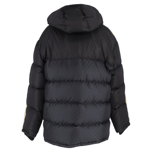 VINTAGE, RRP AS NEW
Make a bold winter statement with the Gucci Logo-Jacquard Webbing-Trimmed Quilted Shell Hooded Down Jacket in Black Nylon. This stylish jacket features Gucci’s iconic interlocking 'GG' insignia, making it an unmistakable fashion-forward choice for colder months. Crafted from a blend of solid and monogrammed black shell, the jacket showcases logo-jacquard taping down the sleeves for a modern, branded touch. The quilted design evenly disperses the down filling, ensuring optimal warmth and comfort while maintaining a sleek silhouette. Whether you're navigating the city streets or enjoying après-ski, this jacket adds a touch of luxury and sophistication to your winter wardrobe, pairing effortlessly with both casual and elevated looks.


Gucci Logo-Jacquard Webbing-Trimmed Quilted Shell Hooded Down Jacket in Black Nylon
Condition: Excellent
Signs of wear: No retail tag but Brand tag on., No visible sign of wear., 
Packaging: None
Color: black
Material: Nylon
Size: INT | XL/IT46
Measurements: Length: 750; Chest: 650
SKU: NAPPUGBCL461250W