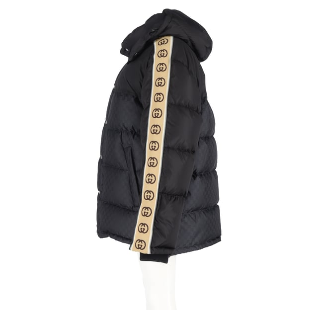 VINTAGE, RRP AS NEW
Make a bold winter statement with the Gucci Logo-Jacquard Webbing-Trimmed Quilted Shell Hooded Down Jacket in Black Nylon. This stylish jacket features Gucci’s iconic interlocking 'GG' insignia, making it an unmistakable fashion-forward choice for colder months. Crafted from a blend of solid and monogrammed black shell, the jacket showcases logo-jacquard taping down the sleeves for a modern, branded touch. The quilted design evenly disperses the down filling, ensuring optimal warmth and comfort while maintaining a sleek silhouette. Whether you're navigating the city streets or enjoying après-ski, this jacket adds a touch of luxury and sophistication to your winter wardrobe, pairing effortlessly with both casual and elevated looks.


Gucci Logo-Jacquard Webbing-Trimmed Quilted Shell Hooded Down Jacket in Black Nylon
Condition: Excellent
Signs of wear: No retail tag but Brand tag on., No visible sign of wear., 
Packaging: None
Color: black
Material: Nylon
Size: INT | XL/IT46
Measurements: Length: 750; Chest: 650
SKU: NAPPUGBCL461250W