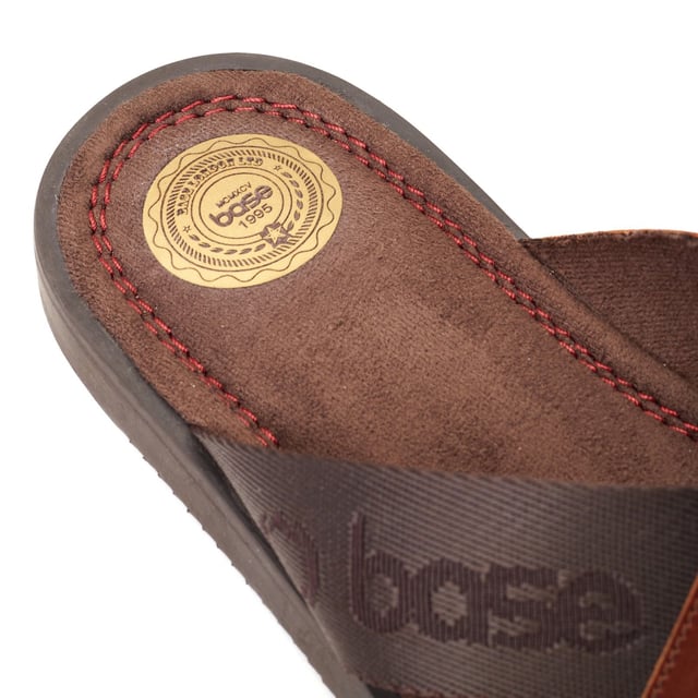 If it's time to upgrade your summer footlocker then look no further than Webb by Base London. More stylish than your average slider, Webb features a soft suede footbed, grippy sole and contrasting leather and nylon straps for a smart casual look.