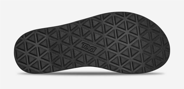 Teva Original Universal Women's Black/White Sandals Eco-friendly adventure sandals featuring the Universal Strapping System™ with multiple adjustable points for a secure fit. Crafted with quick dry webbing made from recycled REPREVE® polyester. Treated with Life Natural, a plant-based peppermint anti odour solution. Durable rubber outsole provides reliable grip for outdoor activities.