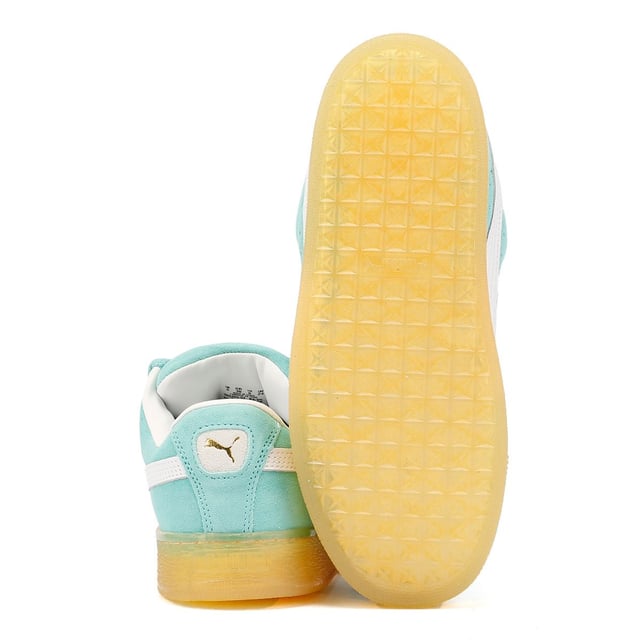 Sneakers featuring a premium suede upper for a sleek and stylish look. Debossed and foil-printed PUMA branding on the quarter panel adds a touch of sophistication. Finished with a durable rubber sole for reliable traction and comfort.